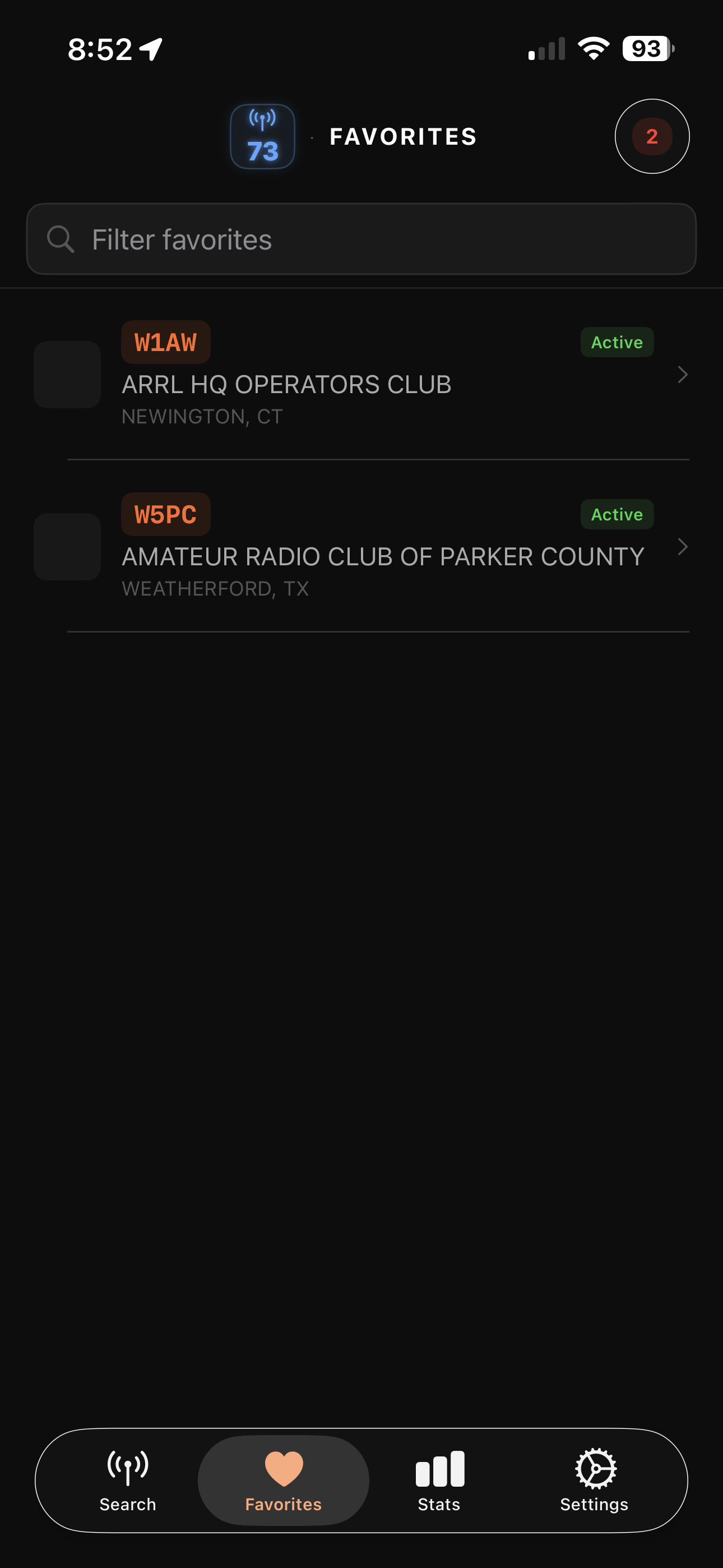 73 Favorites screen showing two saved callsigns, W1AW ARRL HQ and W5PC Amateur Radio Club of Parker County, each with an Active status pill